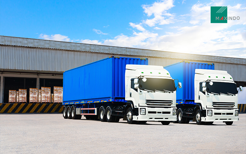 Lorry trucks transporting goods from a warehouse.